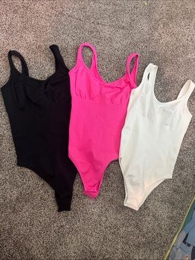 NWOT OQQ bodysuits - Black, White, and Hot Pink ( Size L )